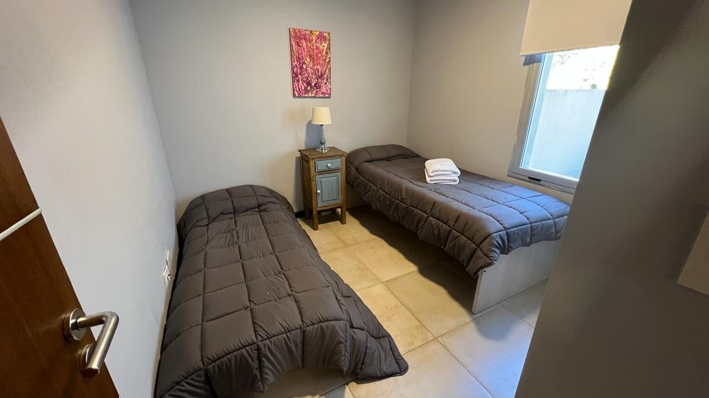 D199 - Departamento de dos dormitorios con cochera - Av San Martin 1300 - Centro